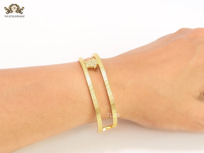 Medusa on gold bracelet