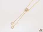 Emerald cut cubic zirconia stones in different sized on sleek gold plated chain