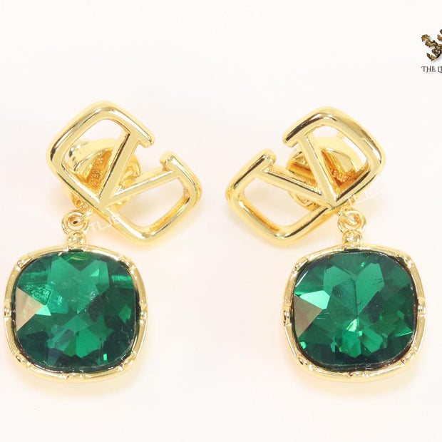 Alphabet open V and emerald stone earrings