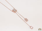 Emerald cut cubic zirconia stones in different sized on sleek rose gold plated chain