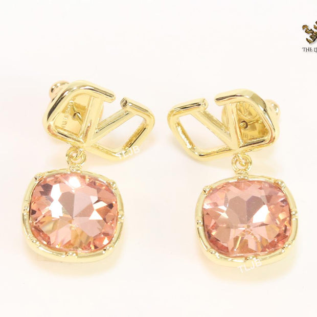 Alphabet open V dangles with pink stone