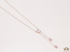 Emerald cut cubic zirconia stones in different sized on sleek rose gold plated chain