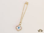 Gold plated cz evil eye clover watch charm with mother of pearl element