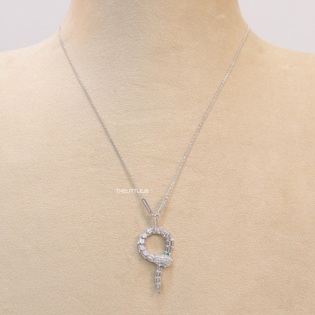 Sleek Platinum plated chain with Platinum plated cubic zirconia ancient serpentine symbol pendant