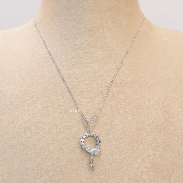 Sleek Platinum plated chain with Platinum plated cubic zirconia ancient serpentine symbol pendant