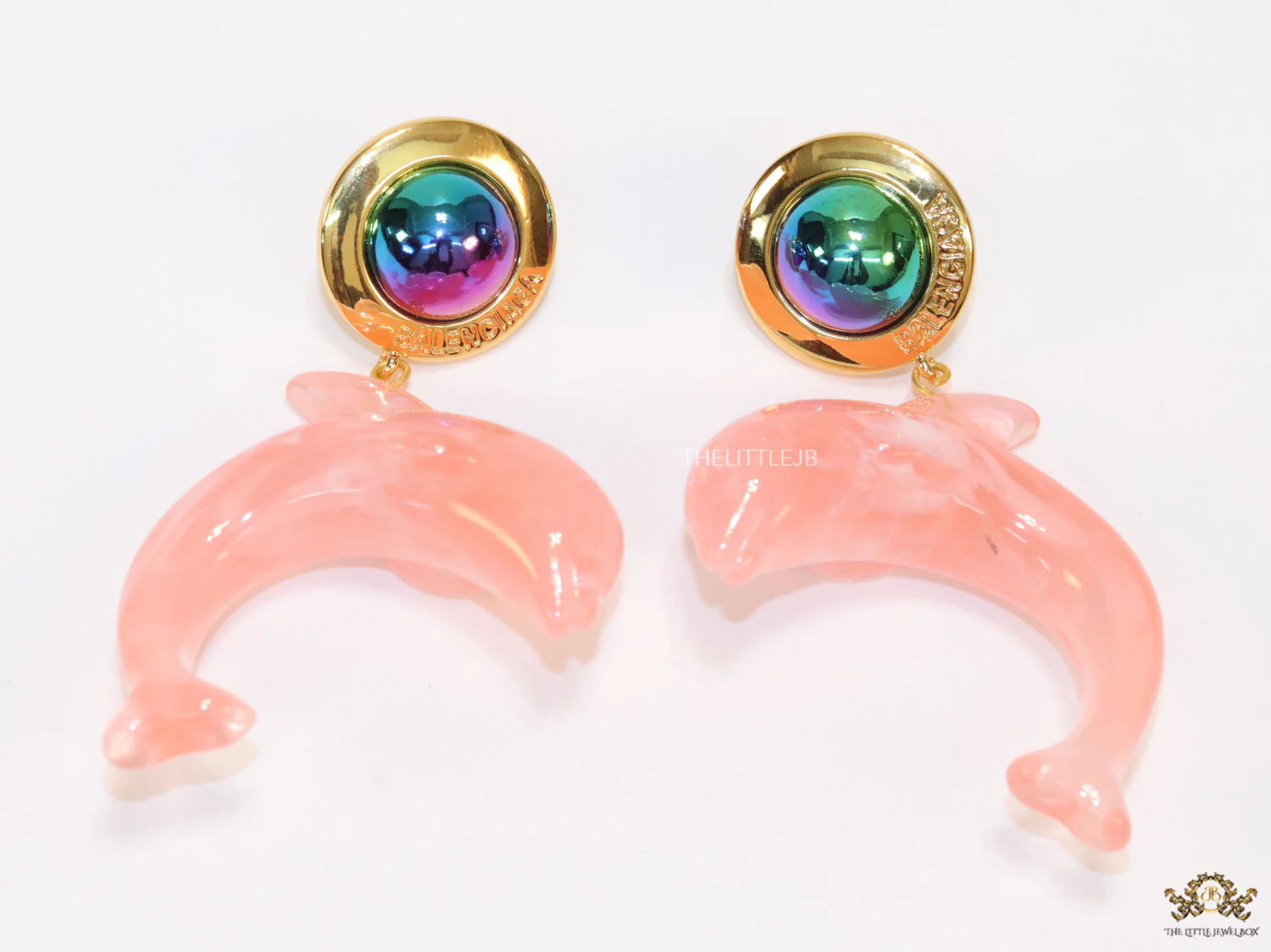 Pink dolphin earring with metallic shade stone