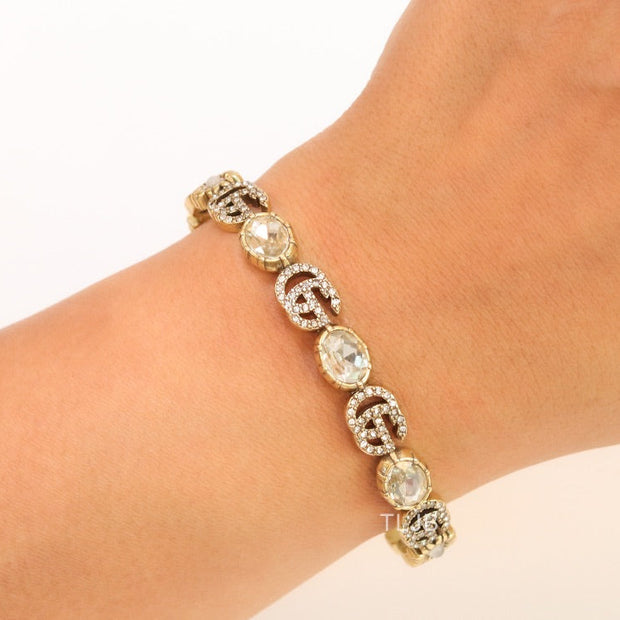 Double G cz with stone open gold bracelet