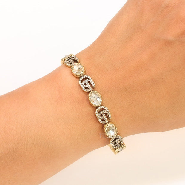Double G cz with stone open gold bracelet