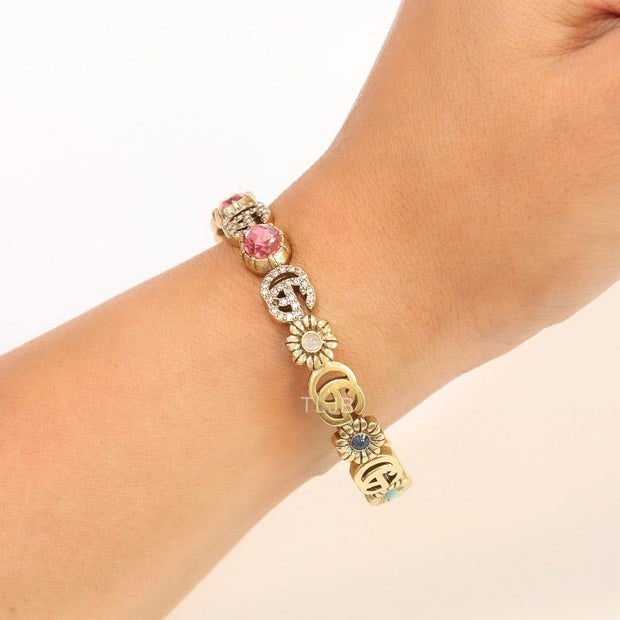Double G cz with pink stone open gold bracelet