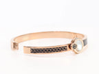 Half textured rose gold & black band
