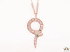 Sleek rose gold plated chain with gold plated cubic zirconia ancient serpentine symbol pendant