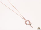 Sleek rose gold plated chain with gold plated cubic zirconia ancient serpentine symbol pendant