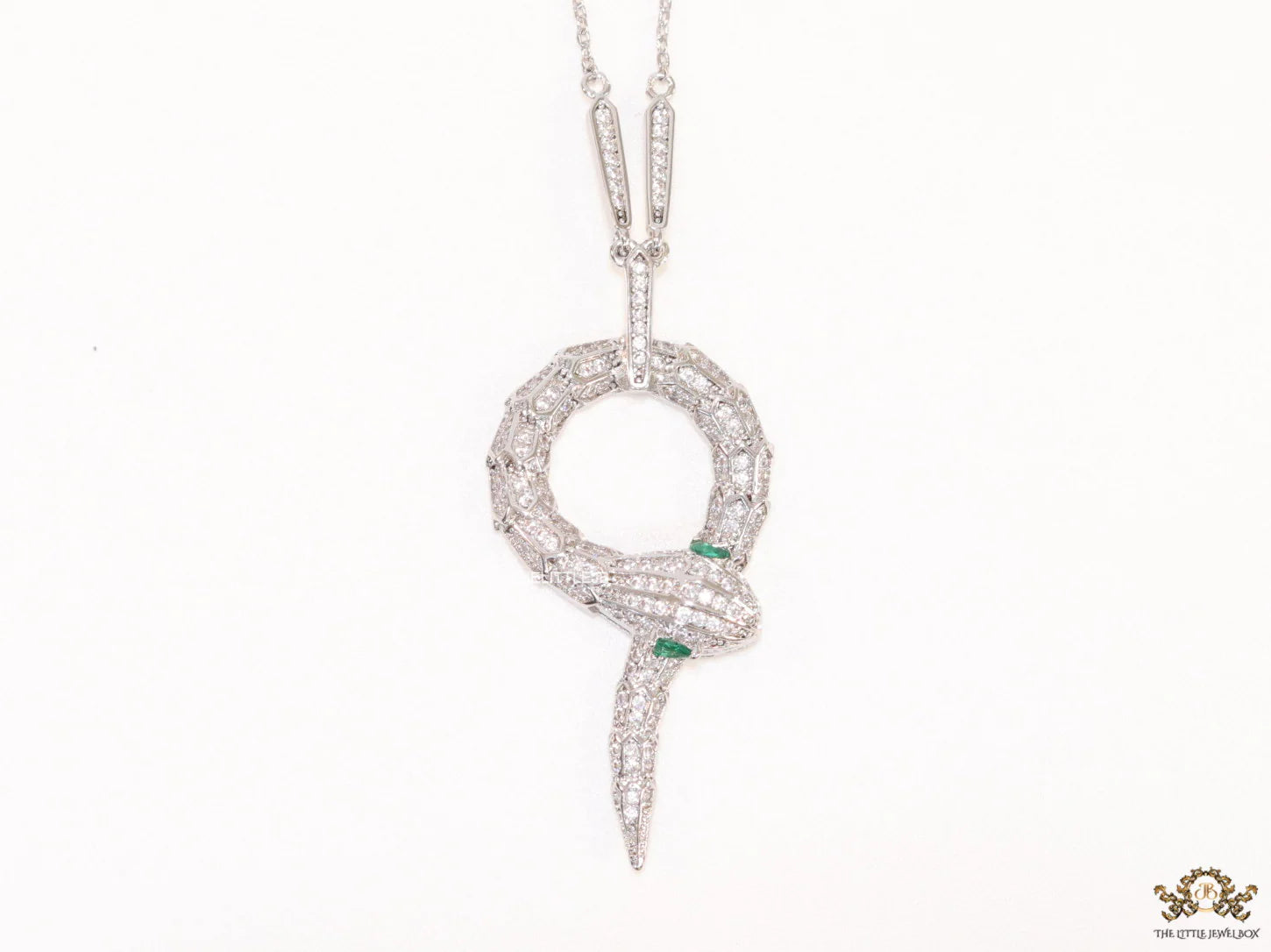 Sleek Platinum plated chain with Platinum plated cubic zirconia ancient serpentine symbol pendant