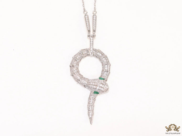 Sleek Platinum plated chain with Platinum plated cubic zirconia ancient serpentine symbol pendant