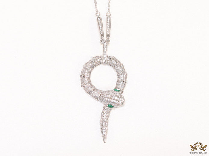 Sleek Platinum plated chain with Platinum plated cubic zirconia ancient serpentine symbol pendant