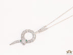 Sleek Platinum plated chain with Platinum plated cubic zirconia ancient serpentine symbol pendant