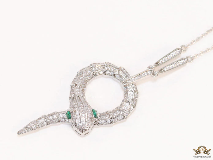 Sleek Platinum plated chain with Platinum plated cubic zirconia ancient serpentine symbol pendant