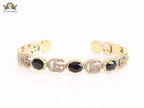 Double G cz with black stone open gold bracelet