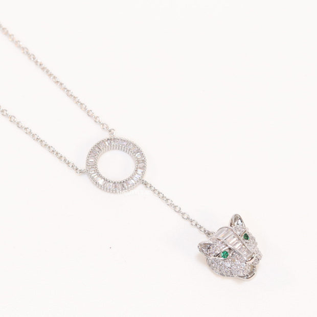 Platinum plated sleek chain with circular cubic zirconia disk and Platinum plated panther face motif pendant