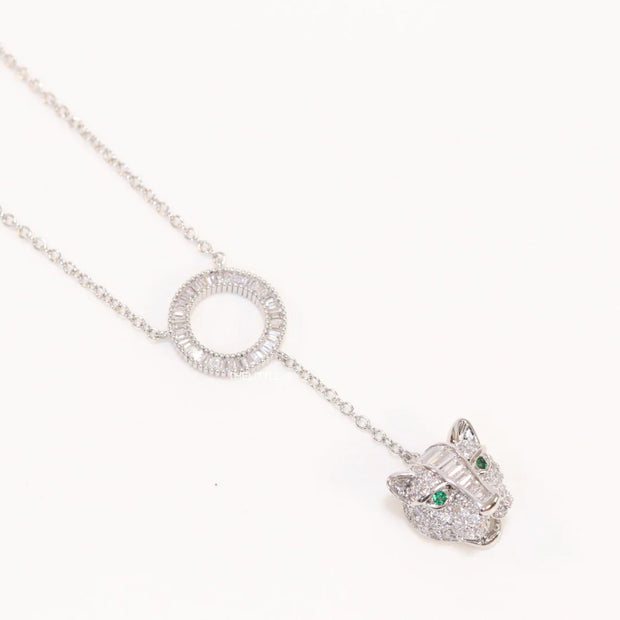 Platinum plated sleek chain with circular cubic zirconia disk and Platinum plated panther face motif pendant