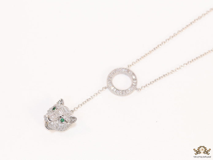 Platinum plated sleek chain with circular cubic zirconia disk and Platinum plated panther face motif pendant