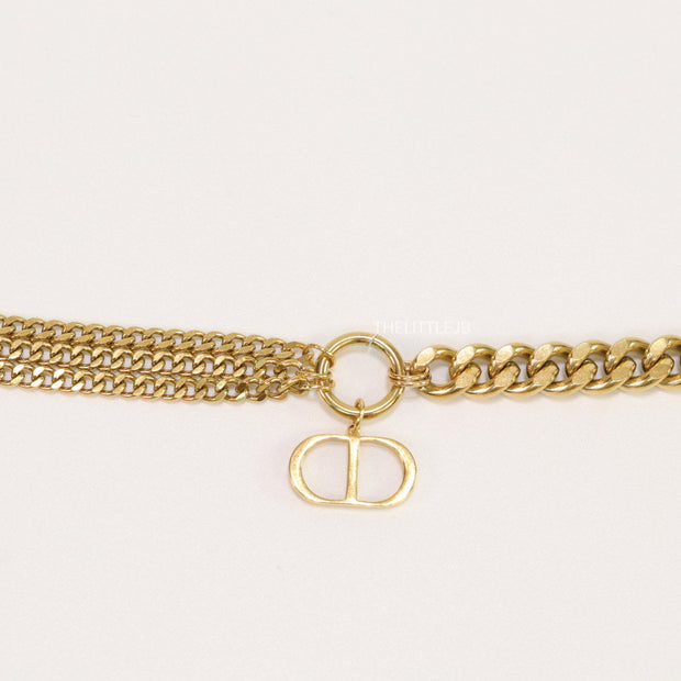 Multiple chain golden bracelet with C and D alphabets