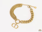 Multiple chain golden bracelet with C and D alphabets
