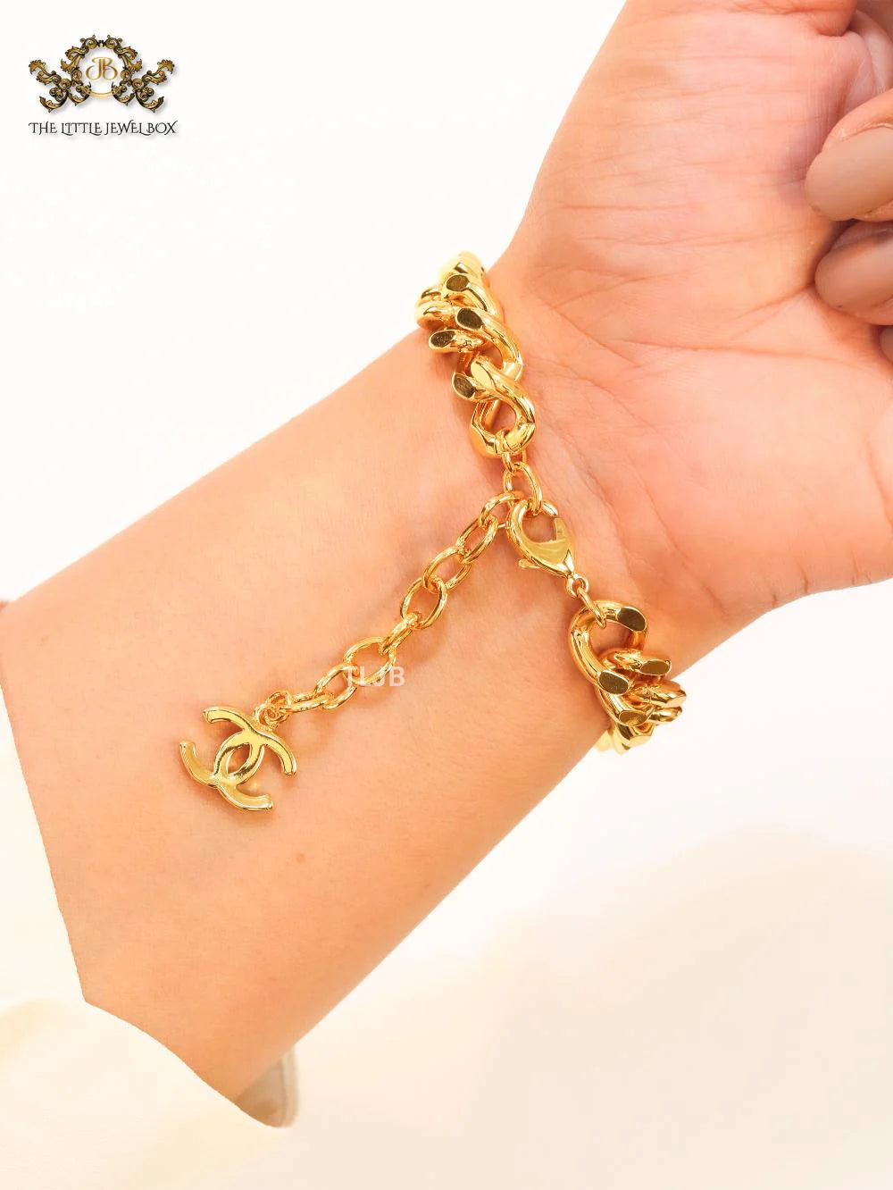 Double C black enamel and  gold link bracelet
