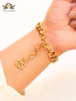 Double C black enamel and  gold link bracelet