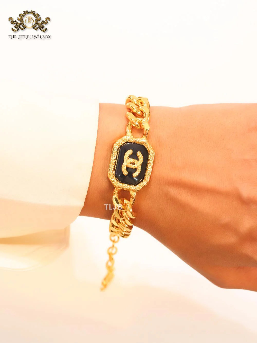 Double C black enamel and  gold link bracelet