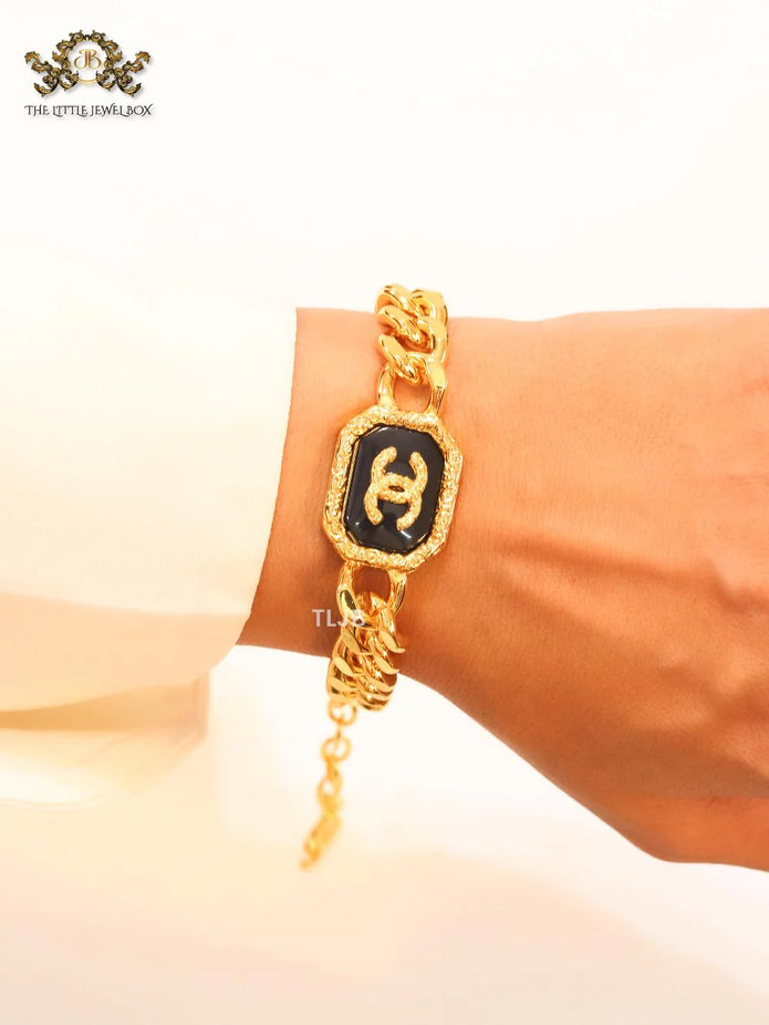 Double C black enamel and  gold link bracelet