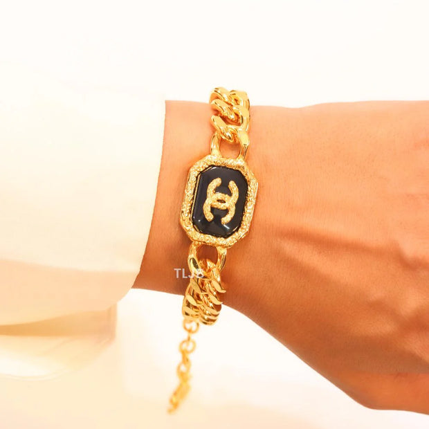 Double C black enamel and  gold link bracelet