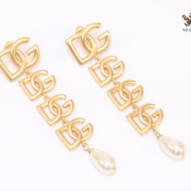 Alphabet D & G dangles with pearl