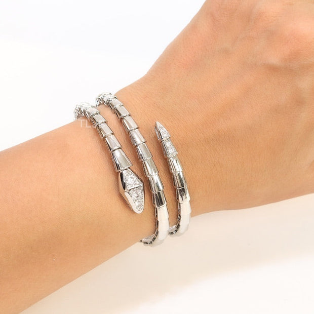 Platinum triple layered serpentine bracelet with cz
