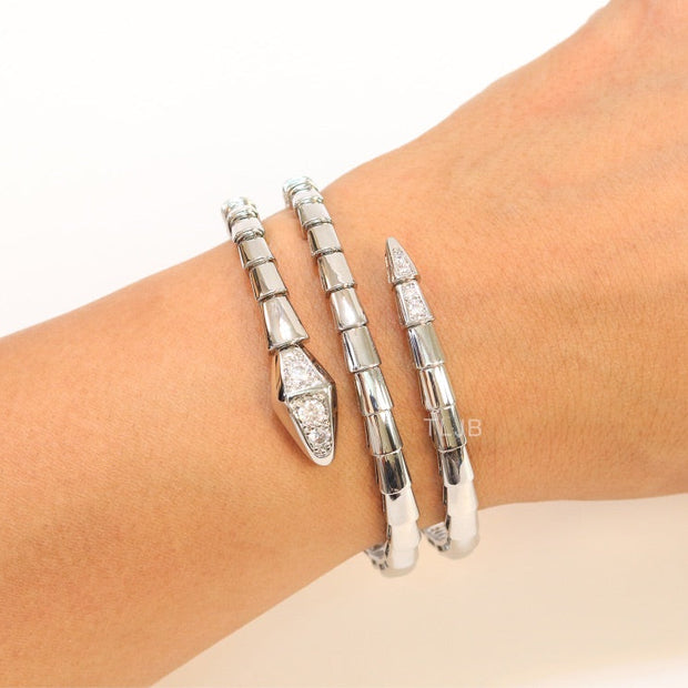 Platinum triple layered serpentine bracelet with cz