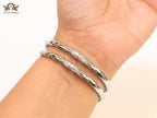 Platinum triple layered snake bracelet with cz