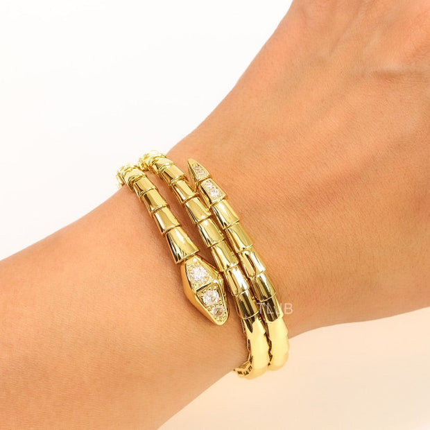 Gold triple layered snake bracelet with cz