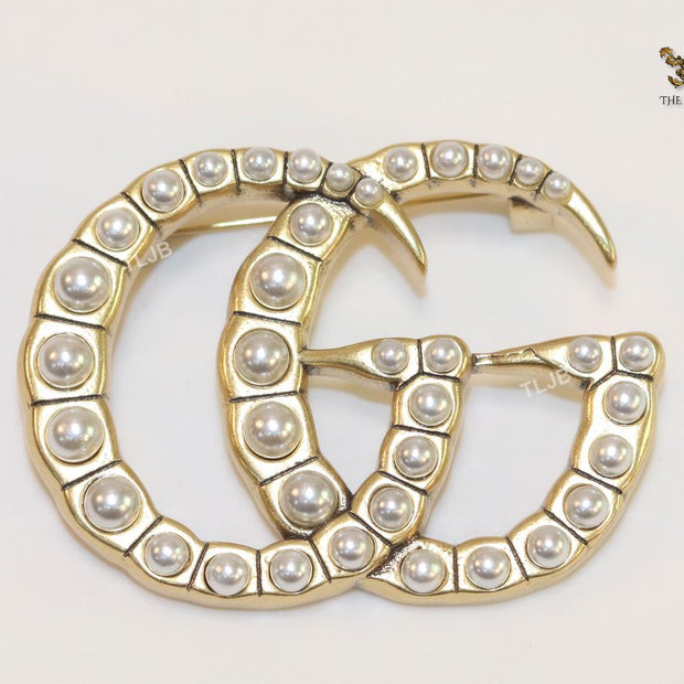 Double G pearl & gold brooch