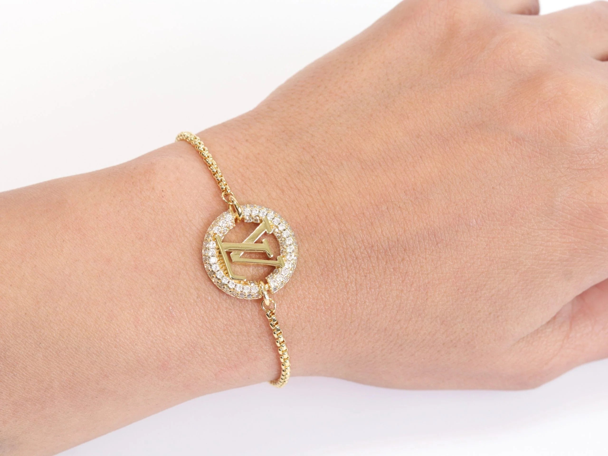 Alphabet L & V cz gold bracelet