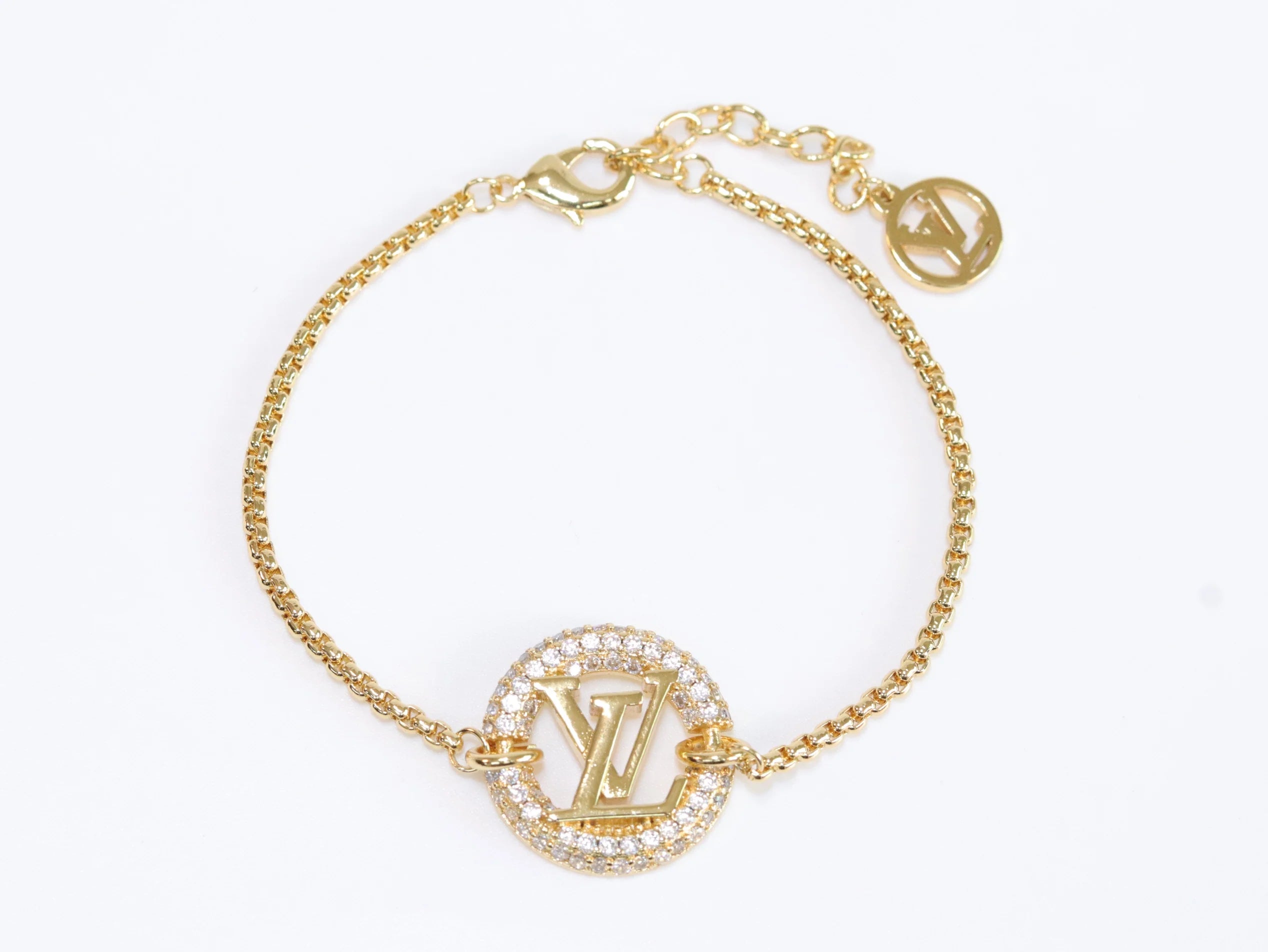 Alphabet L & V cz gold bracelet