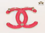 Double C green and pink stone brooch