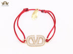 Alphabet V gold cz on Red Thread Bracelet