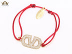 Alphabet V gold cz on Red Thread Bracelet