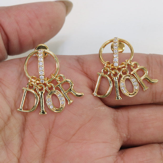 Gold plated alphabet earrings with cz