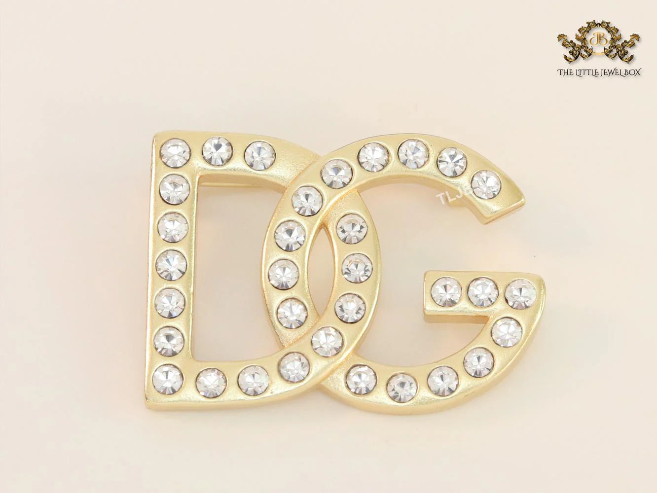 Alphabet DG Matt gold brooch with zircons
