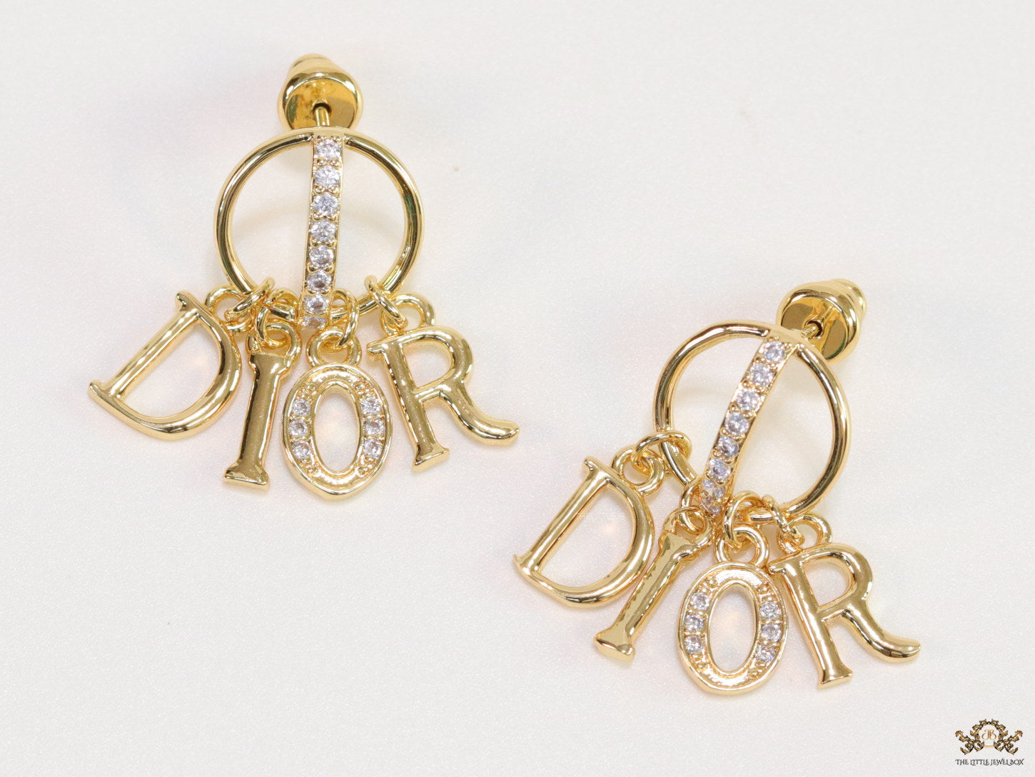 Gold plated alphabet earrings with cz