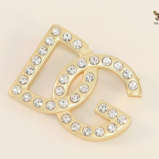 Alphabet DG Matt gold brooch with zircons