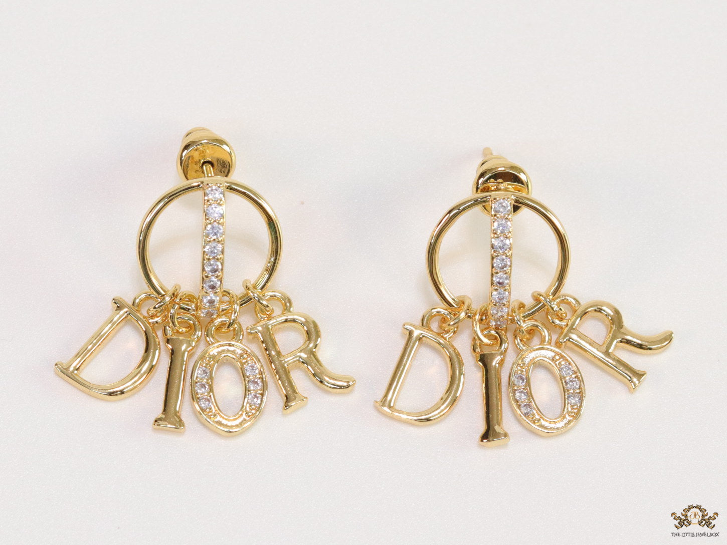 Gold plated alphabet earrings with cz