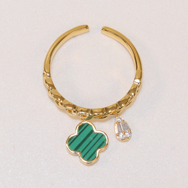 Gold plated link chain ring with malachite green clover and cz drop