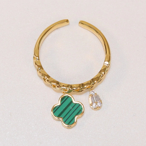 Gold plated link chain ring with malachite green clover and cz drop